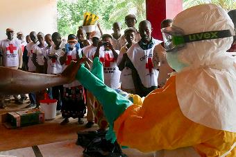 An old man in Tanzania, having his blood pressure checked